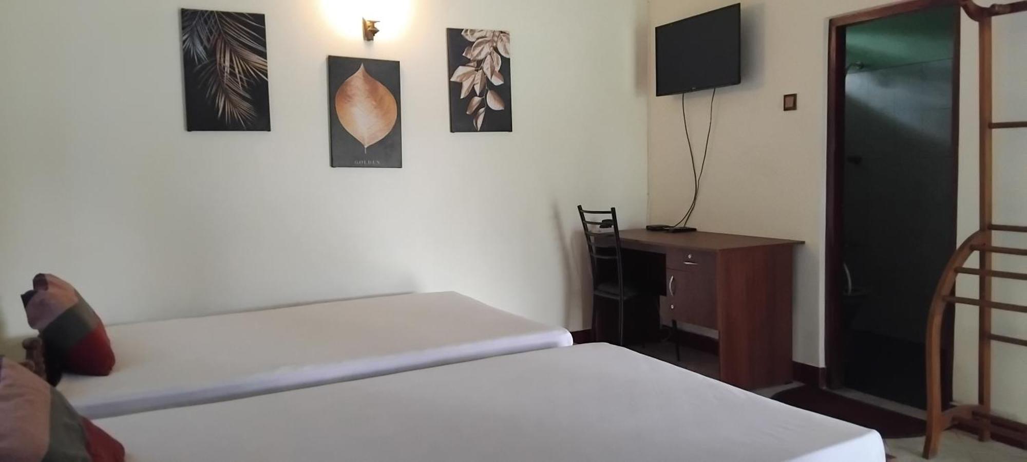 Hansika Guest Inn Buttala Rum bild